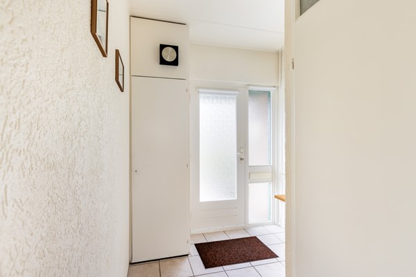 Foto - Te koop: tussenwoning gelegen aan groenvoorziening